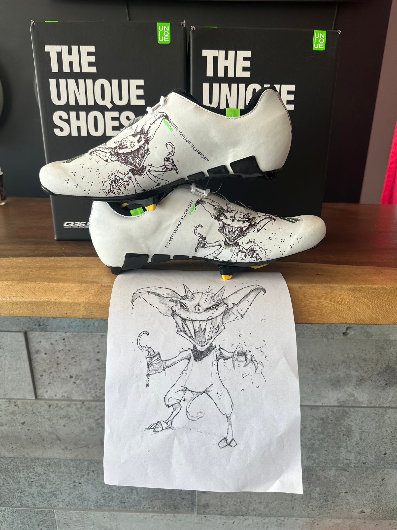 Q36.5 Unique road cycling shoes with Raphaelle’s original freehand little devil illustration, custom painted at Squad Cycles